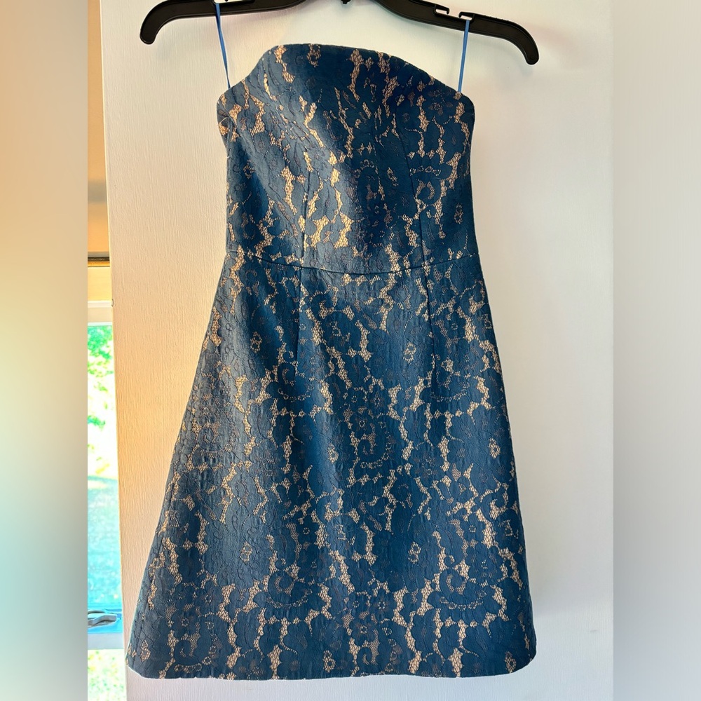 Sleeveless cocktail or wedding guest dress